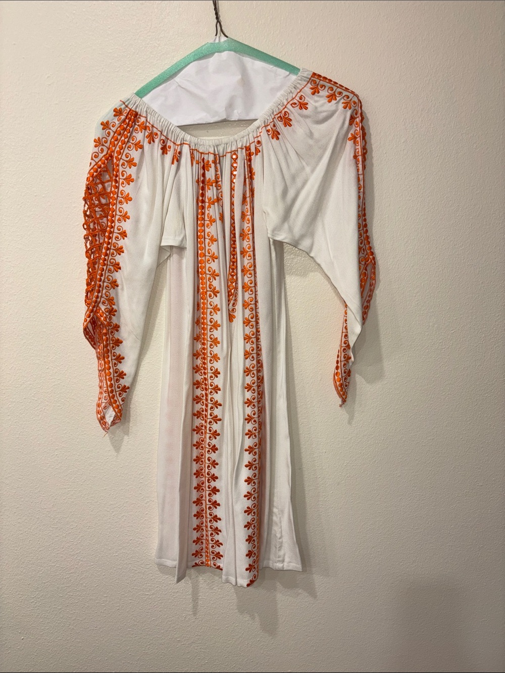 Taj White Off-Shoulder Dress with Orange Embroidery. Dramatic sleeve. Size S